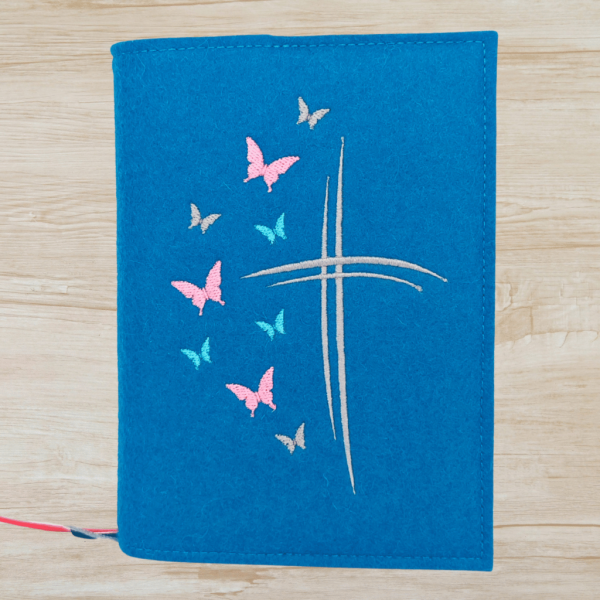 Wosadnikhülle in petrol, Kreuze, Schmetterlinge